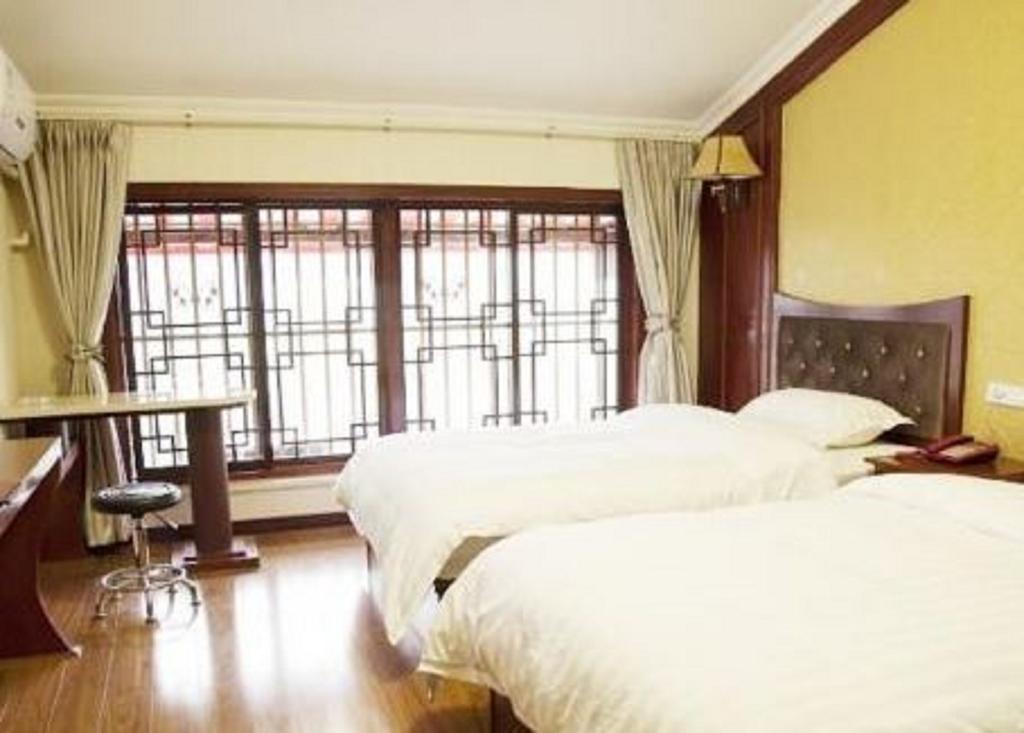 Xingzhou Hotel Leshan Bilik gambar